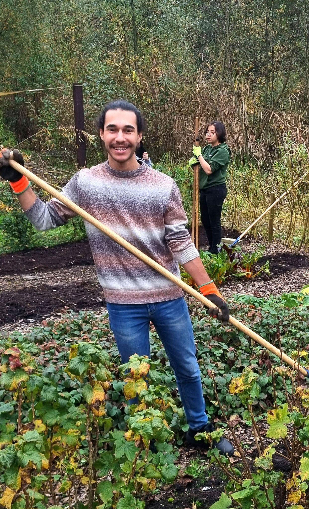 Picture of Santiago, working in a local garden.